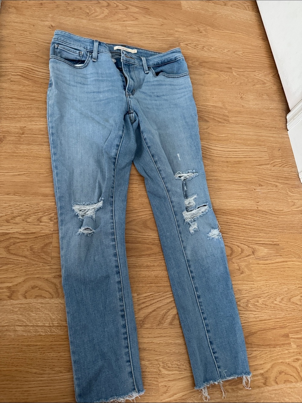 Levi's Light Blue Distressed Skinny Jeans